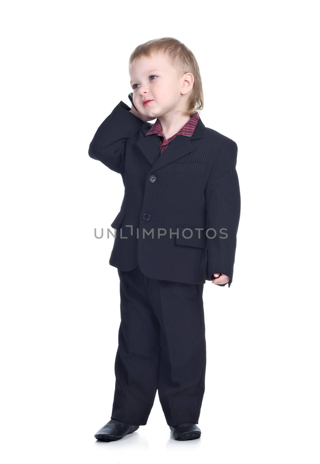 Little businessman with a phone isolated on the white