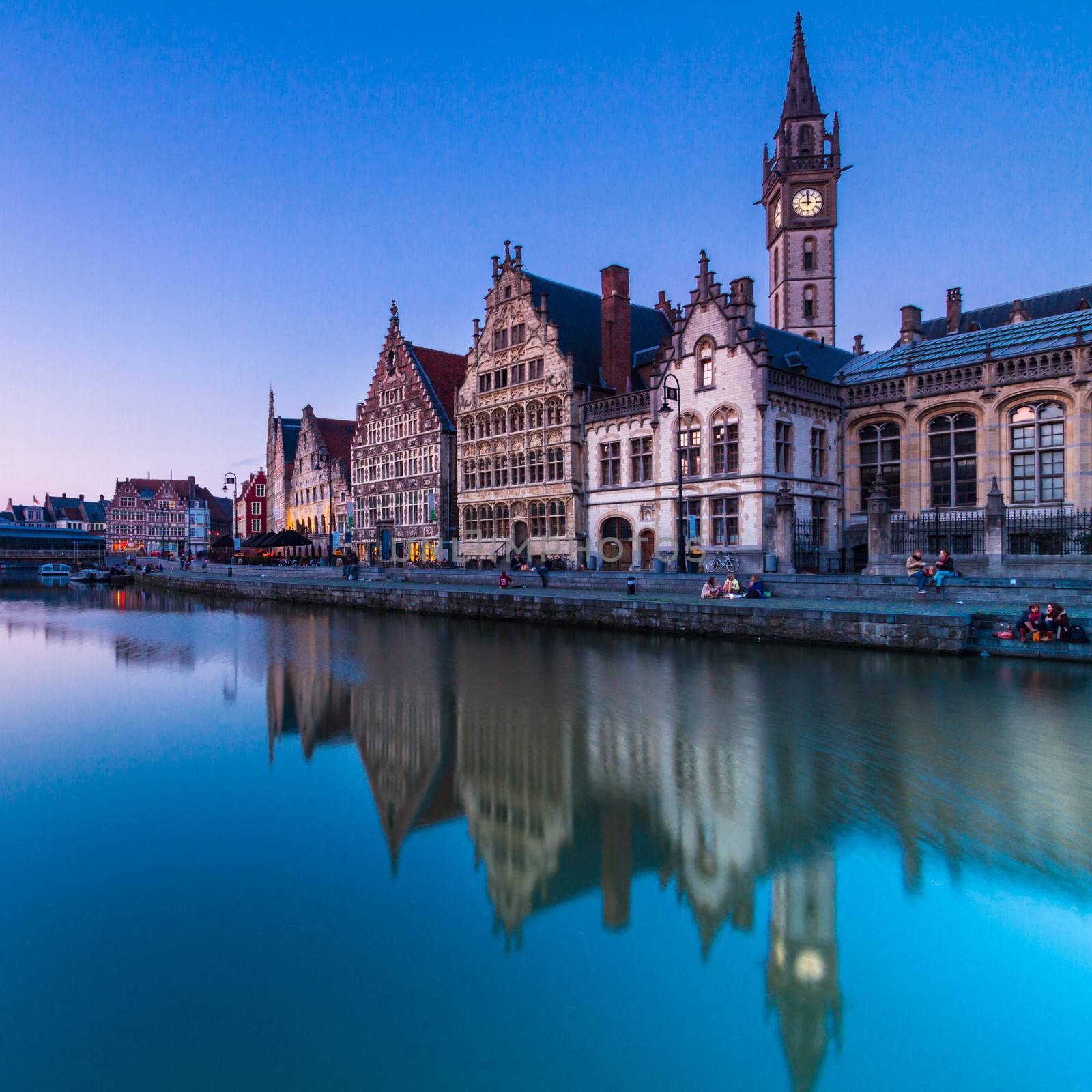 Picturesque medieval buildings overlooking the "Graslei harbor" on Leie river in Ghent town, Belgium, Europe.