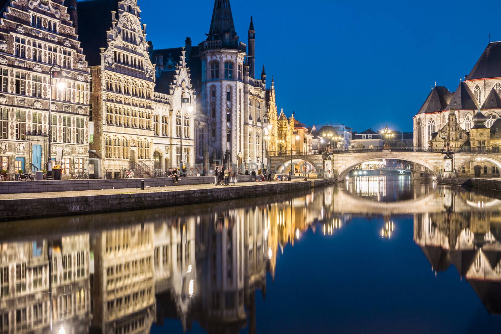 Picturesque medieval buildings overlooking the "Graslei harbor" on Leie river in Ghent town, Belgium, Europe.