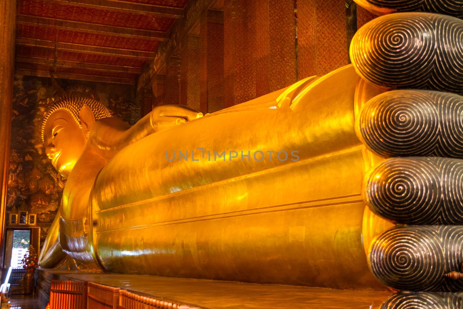 Reclining  buddha in wat Pho temple, Bangkok, Thailand. by kasto