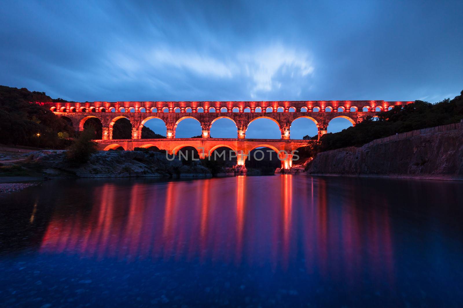 The Pont du Gard (Bridge of the Gard) is an ancient Roman aqueduct bridge that crosses the Gardon River in Vers-Pont-du-Gard near Remoulins, in the Gard d��partement of southern France, Europe.