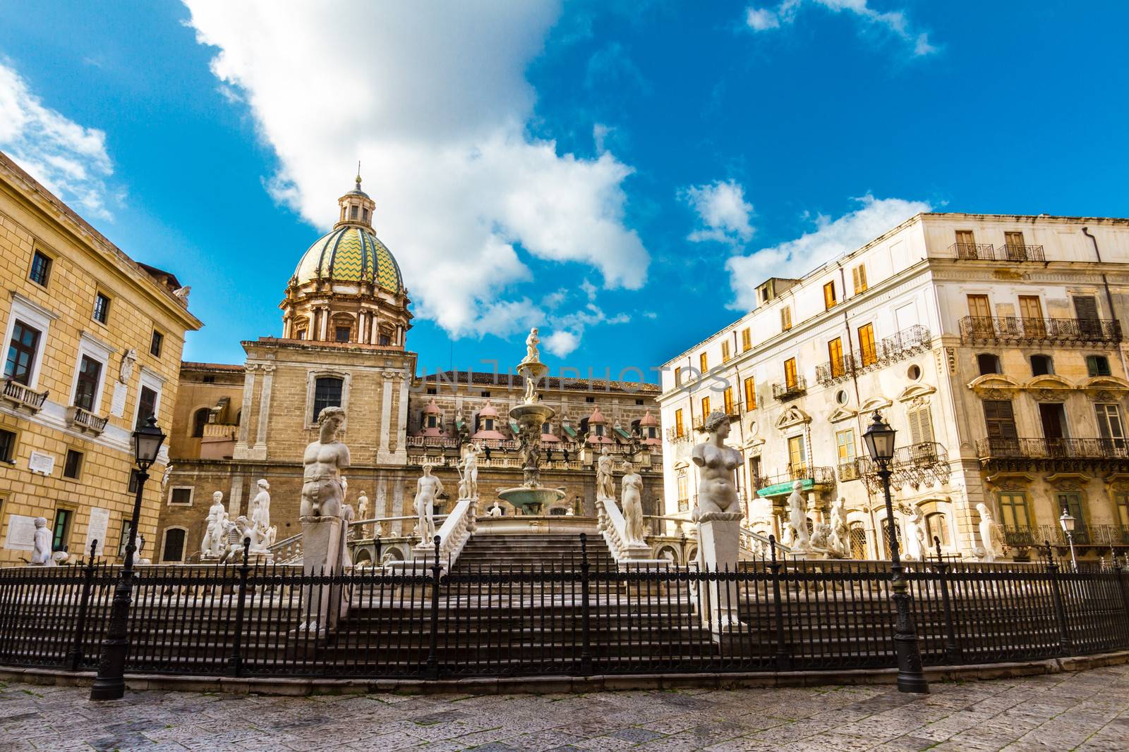 In the heart of Palermo's loveliest square, Piazza Pretoria, stands this magnificent fountain, Fontana Pretoria, work of the Florentine sculptor Francesco Camilliani. Palermo, Sicily, Italy.