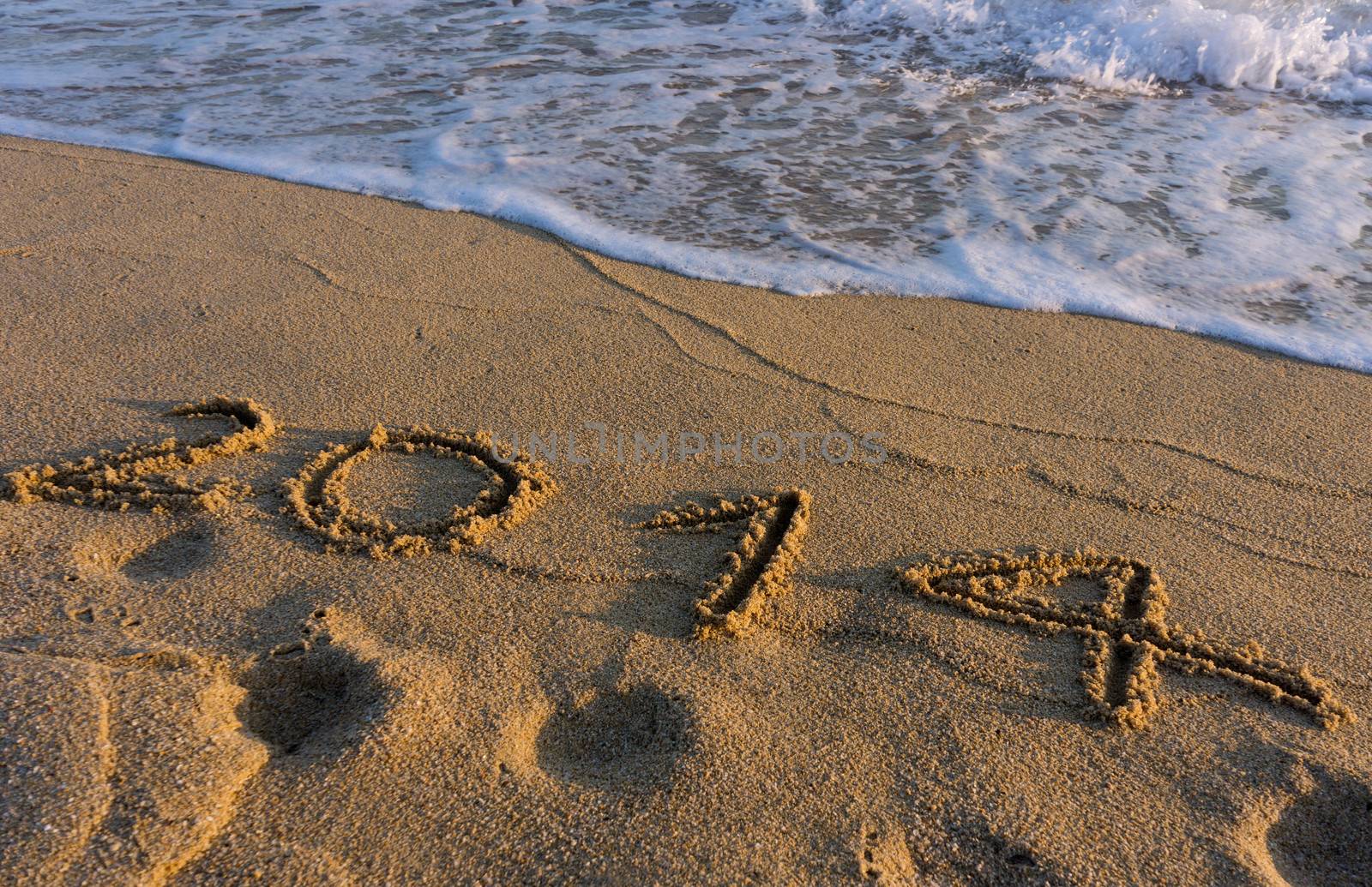 Year 2014 on the beach by photosil