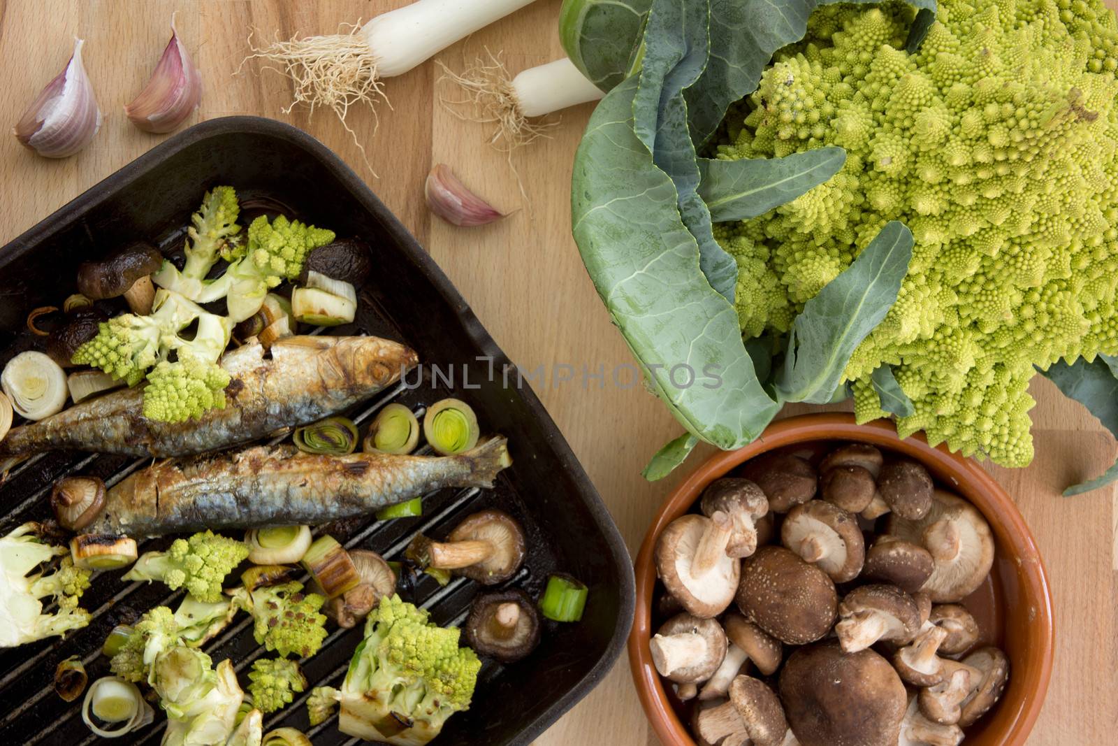 Sardines with romanesco broccoli, leek and shitake mushrooms