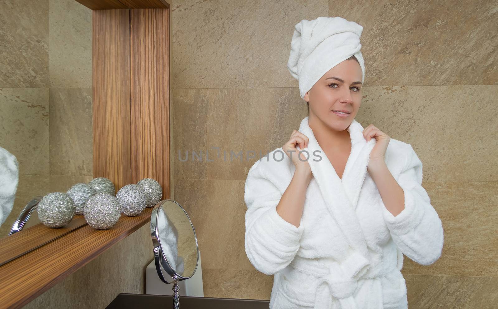 Portrait of beautiful woman with a white bathrobe by doble.d