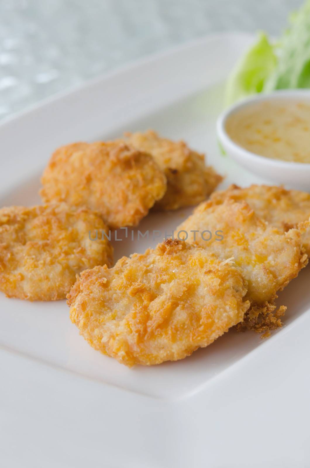 close up Thai Food Fried Fish Cake (Tod Mun Pla) with sweet sauce
