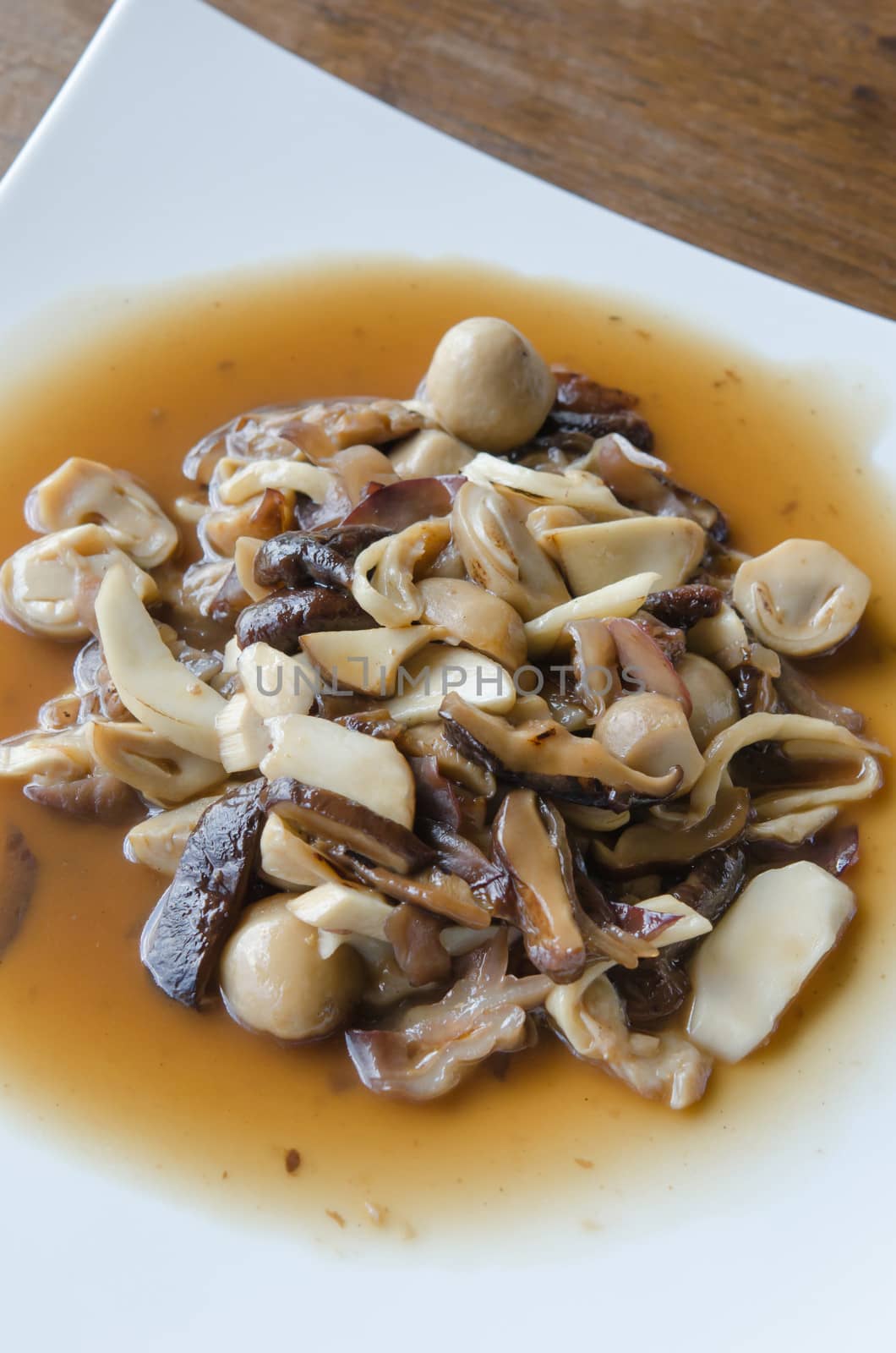 top view Stir fried  mushroom with oyster sauce on dish