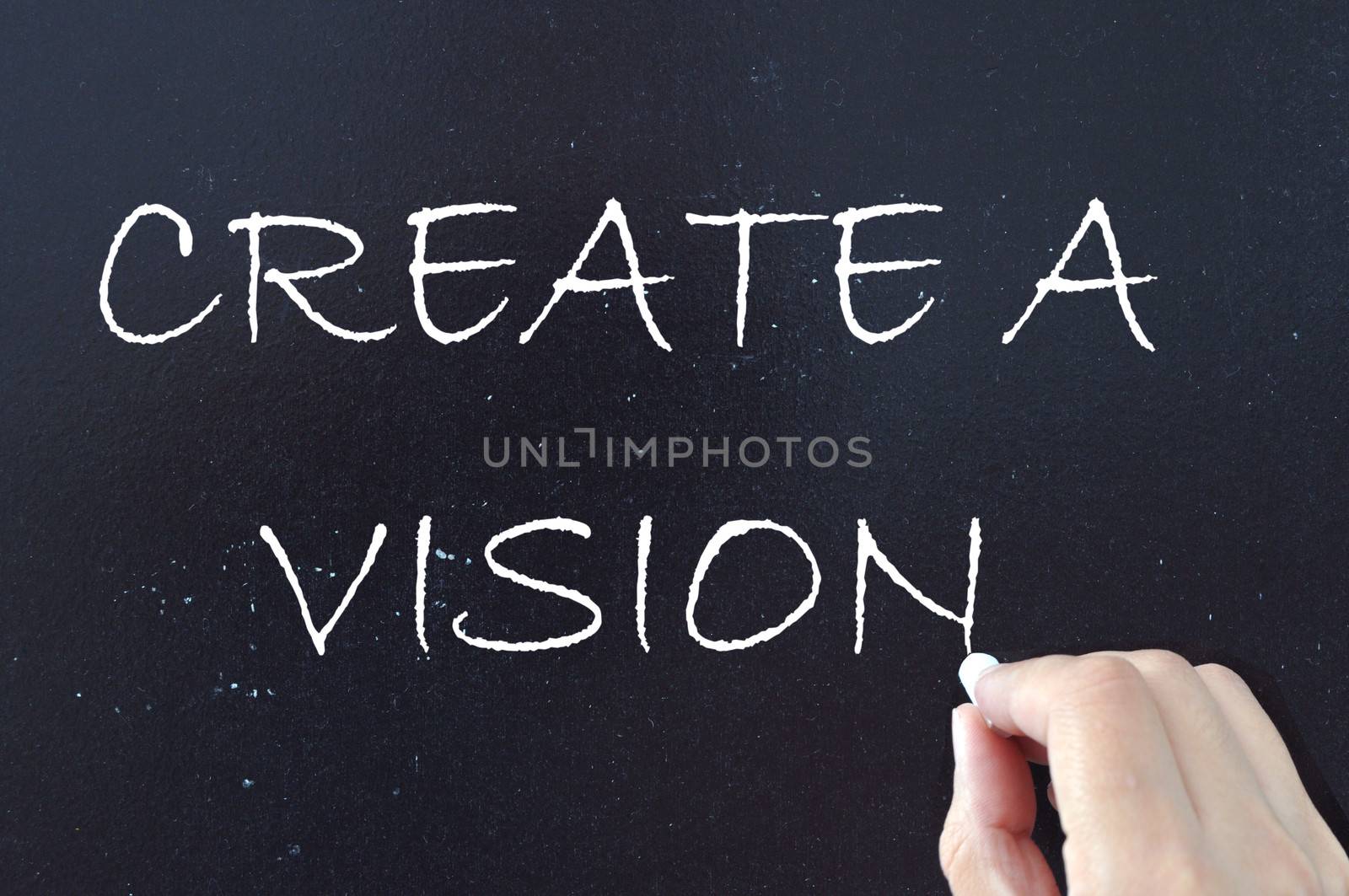 Create a vision handwritten on a chalkboard 