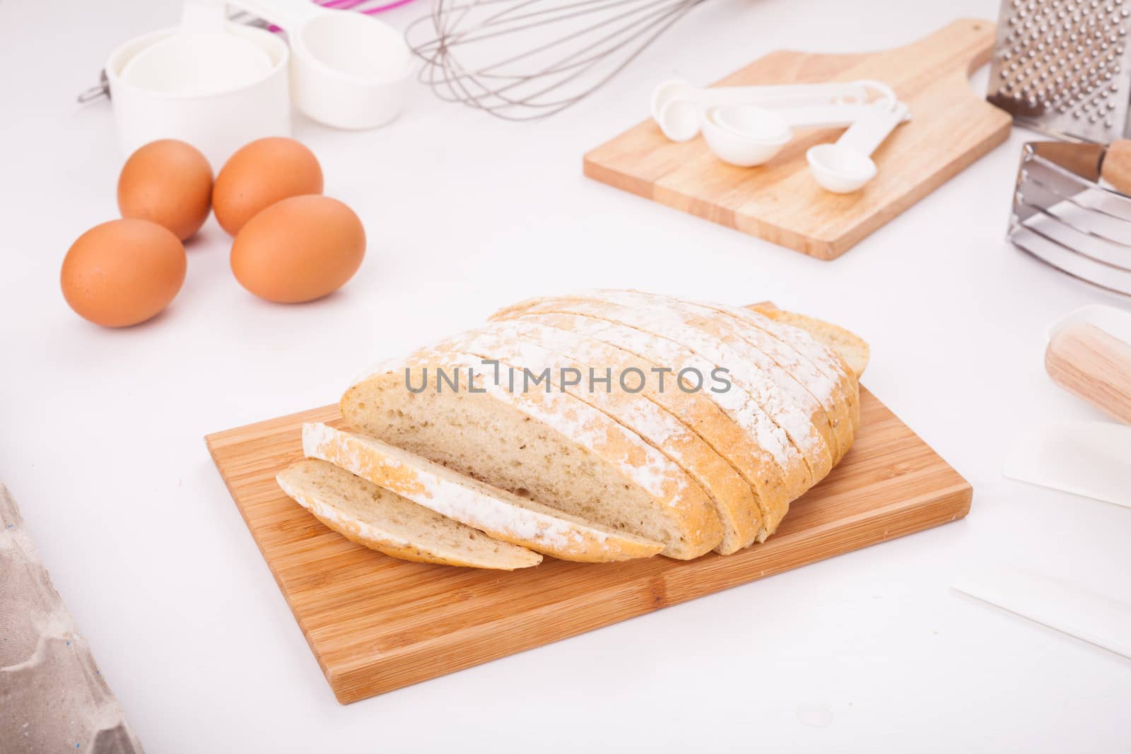 Fresh bread, cut into strips Placed on the table along with equipment for the bakery.