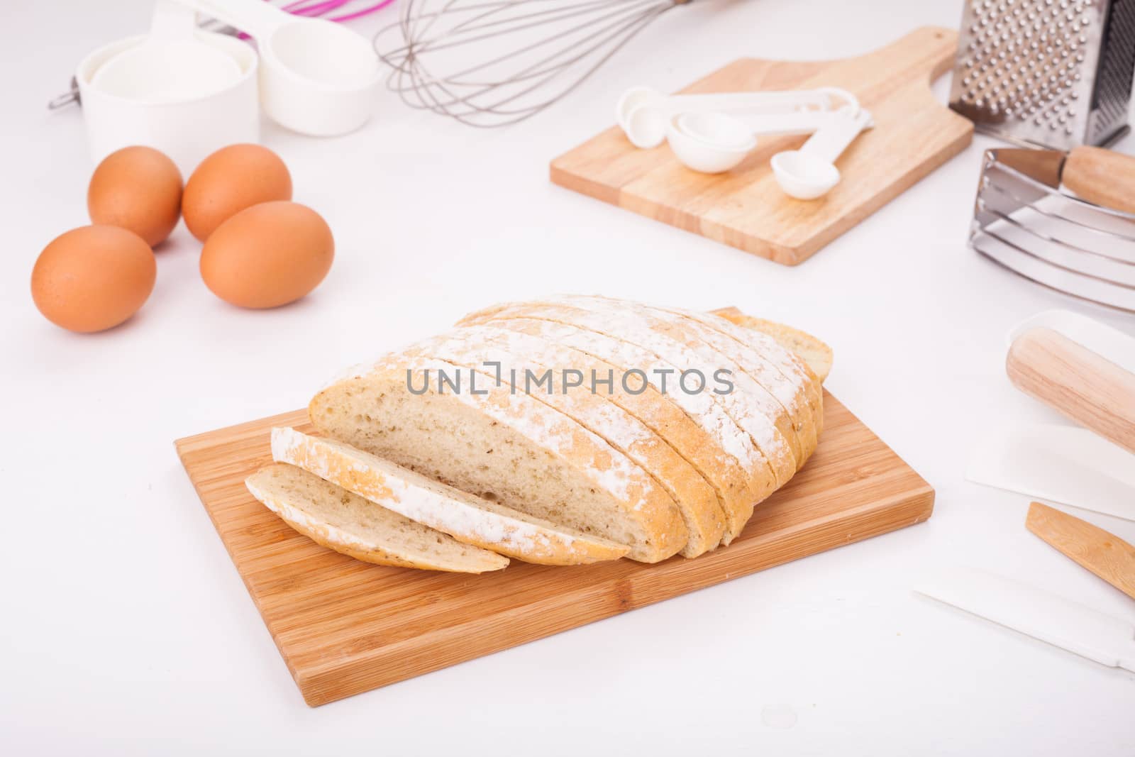 Fresh bread, cut into strips Placed on the table along with equipment for the bakery.