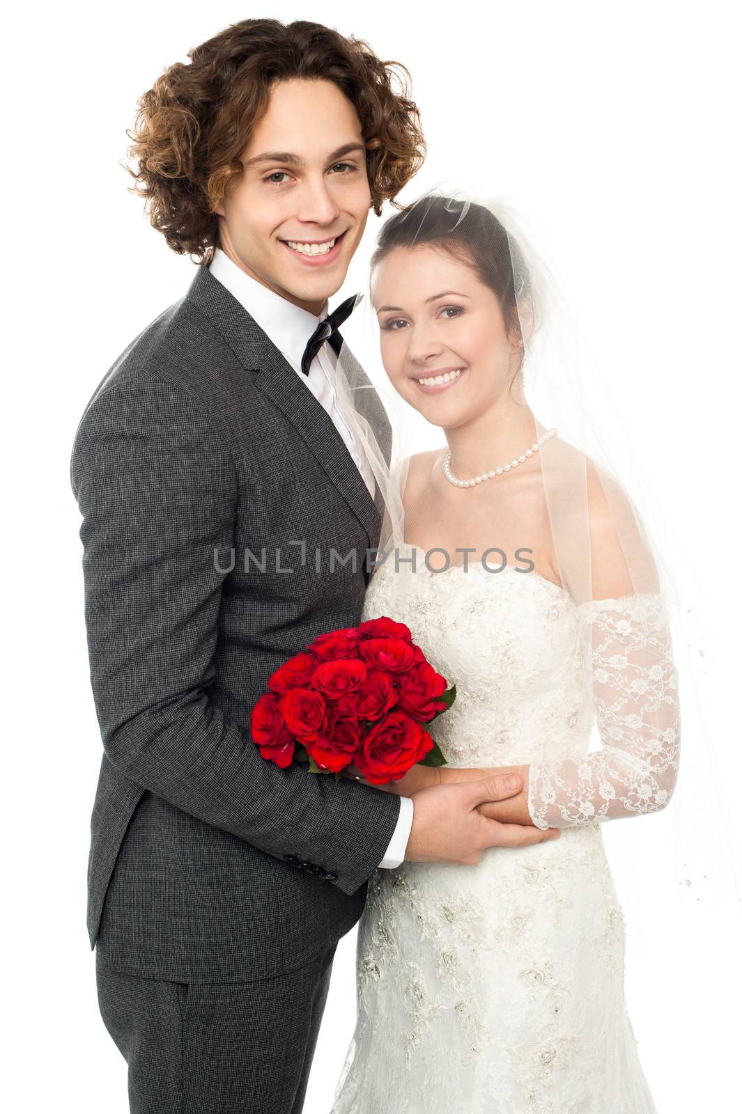 Wedding couple posing together by stockyimages