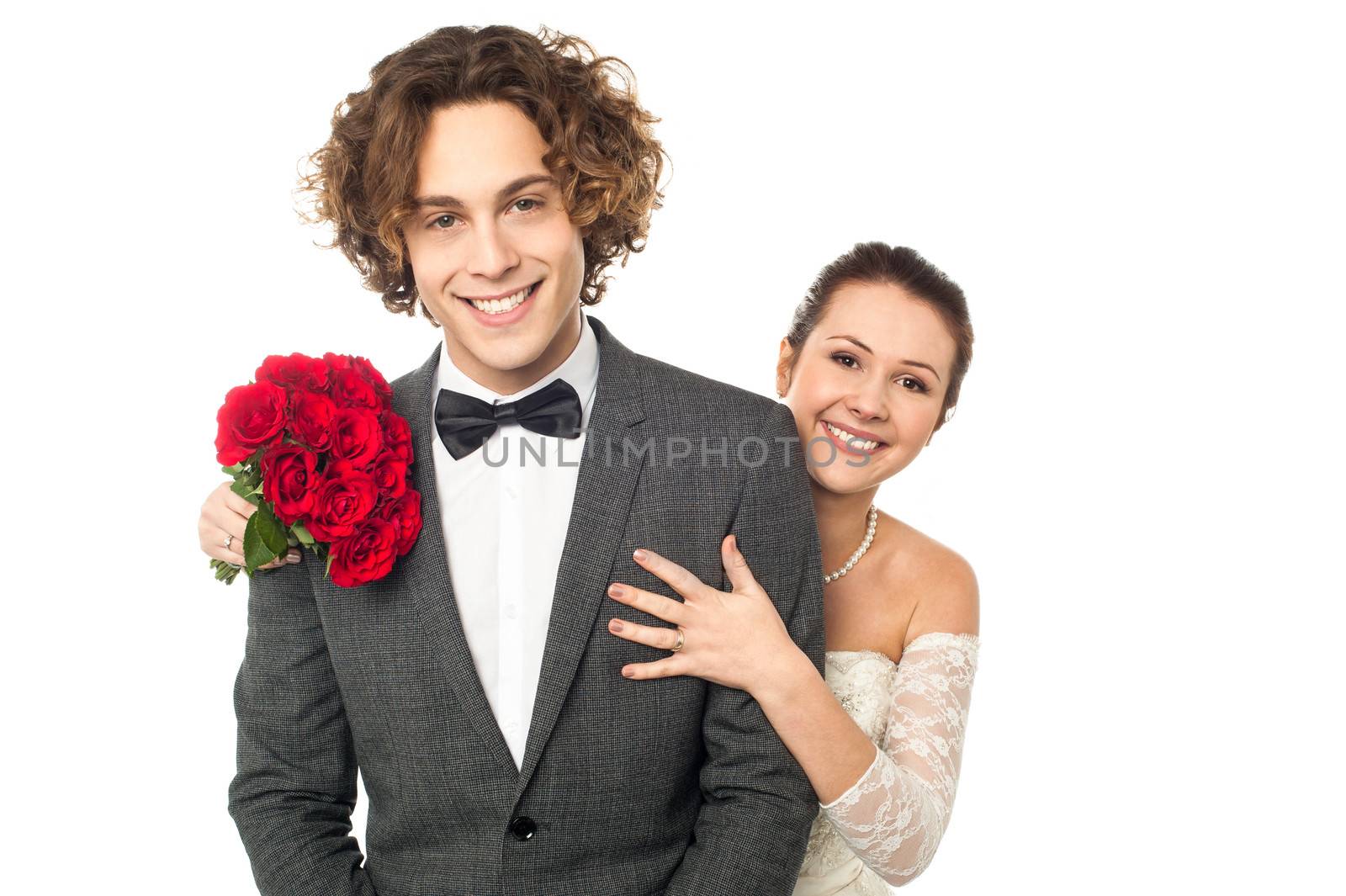 Studio shot of a newlywed couple by stockyimages