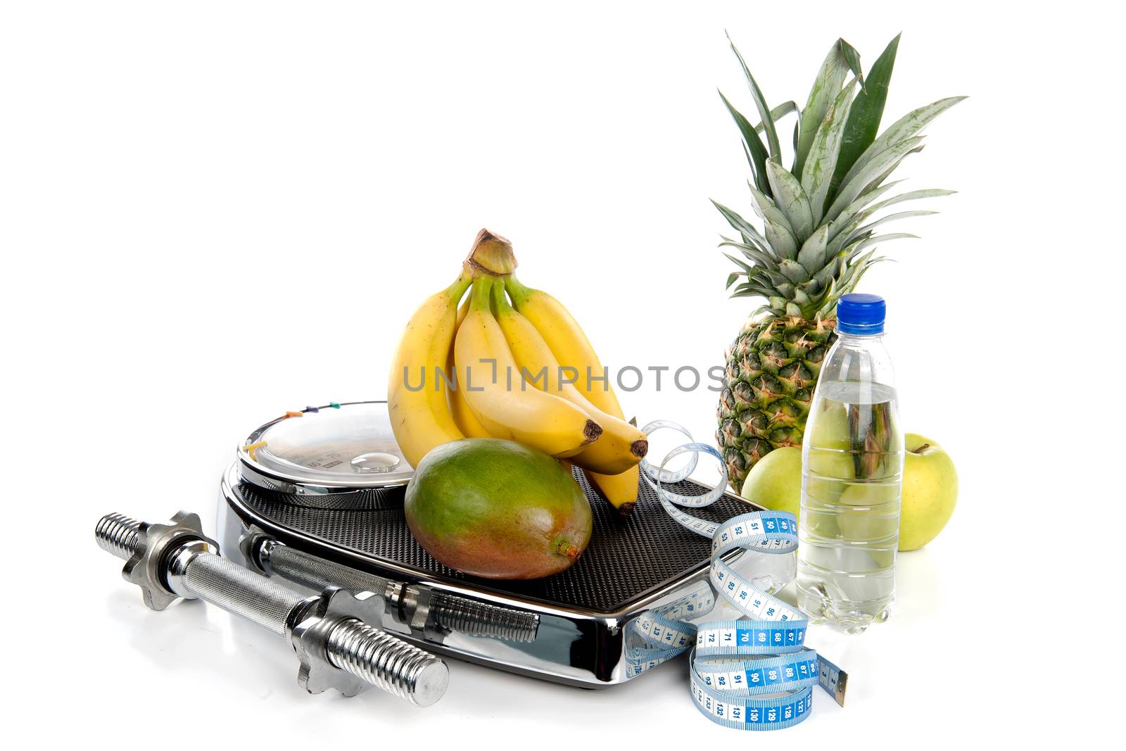a weighing scale with fruits, water and a measuring-tape on a white background