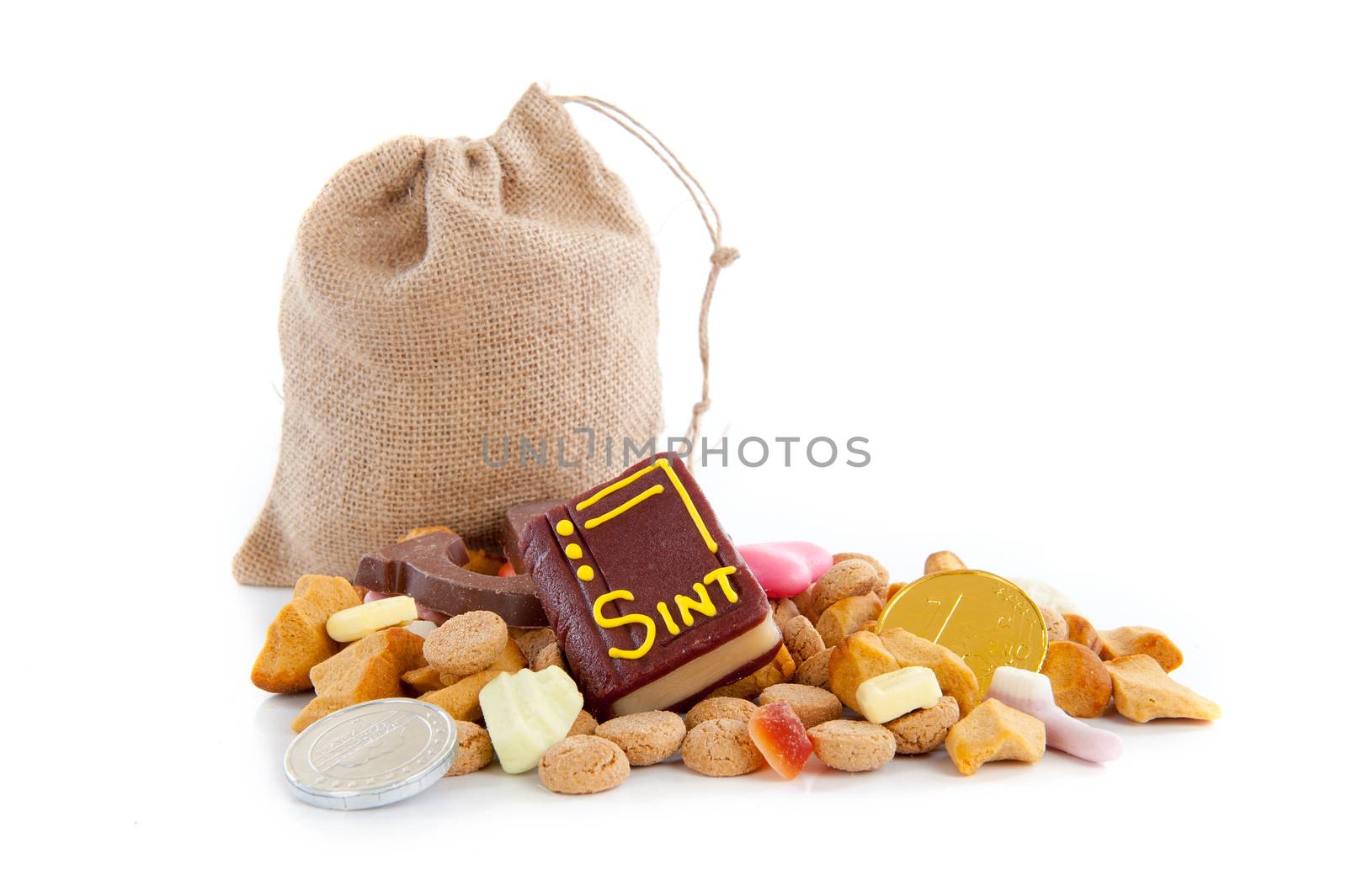 A jute bag full of pepernoten, for celebrating a dutch holiday " Sinterklaas "  on the fifth of December