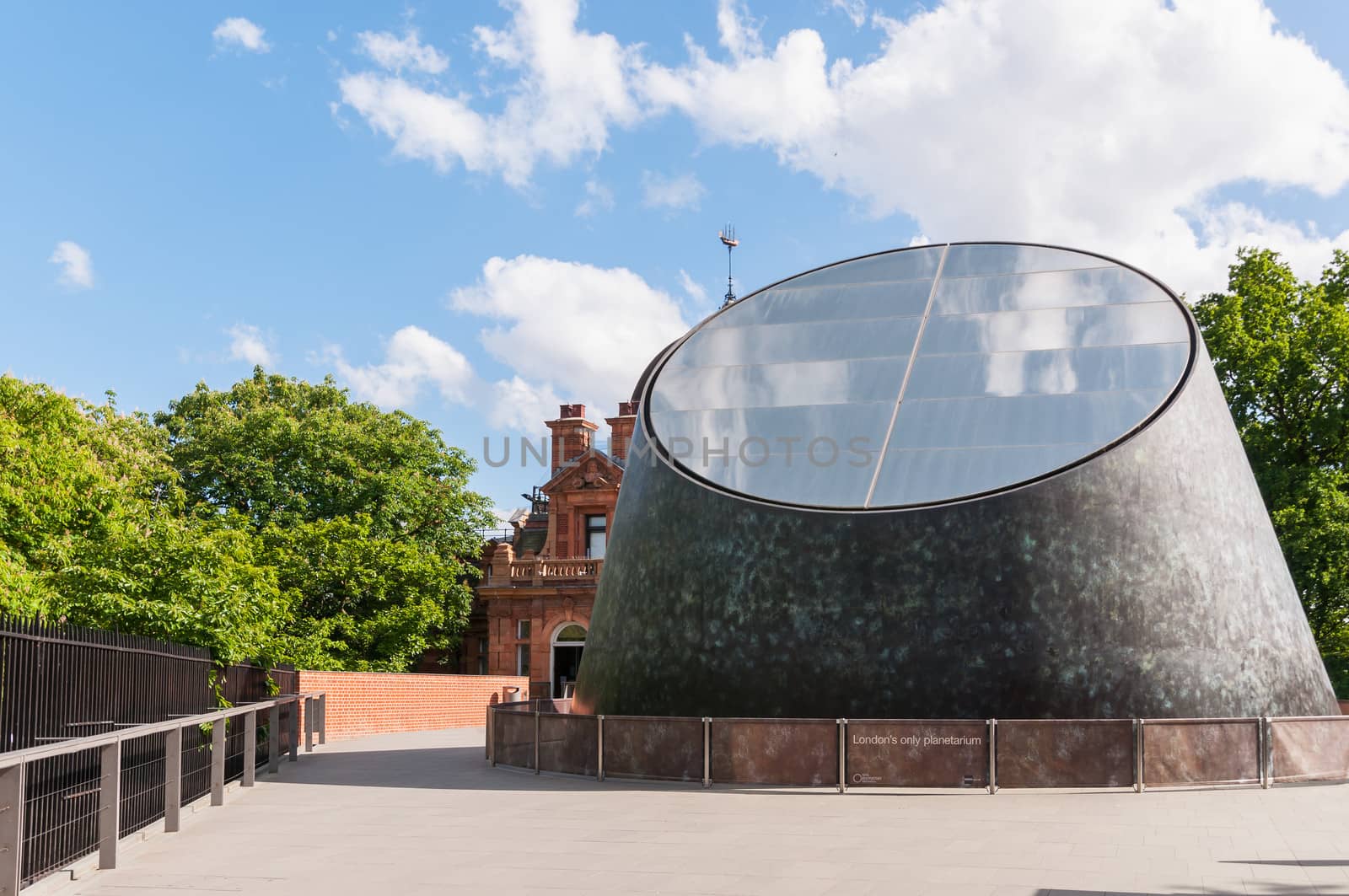 London, United Kingdom - May 9, 2011: Building of the Peter Harrison Planetarium. It is a 120-seat digital laser planetarium, situated in Greenwich Park, London and is part of the National Maritime Museum.
