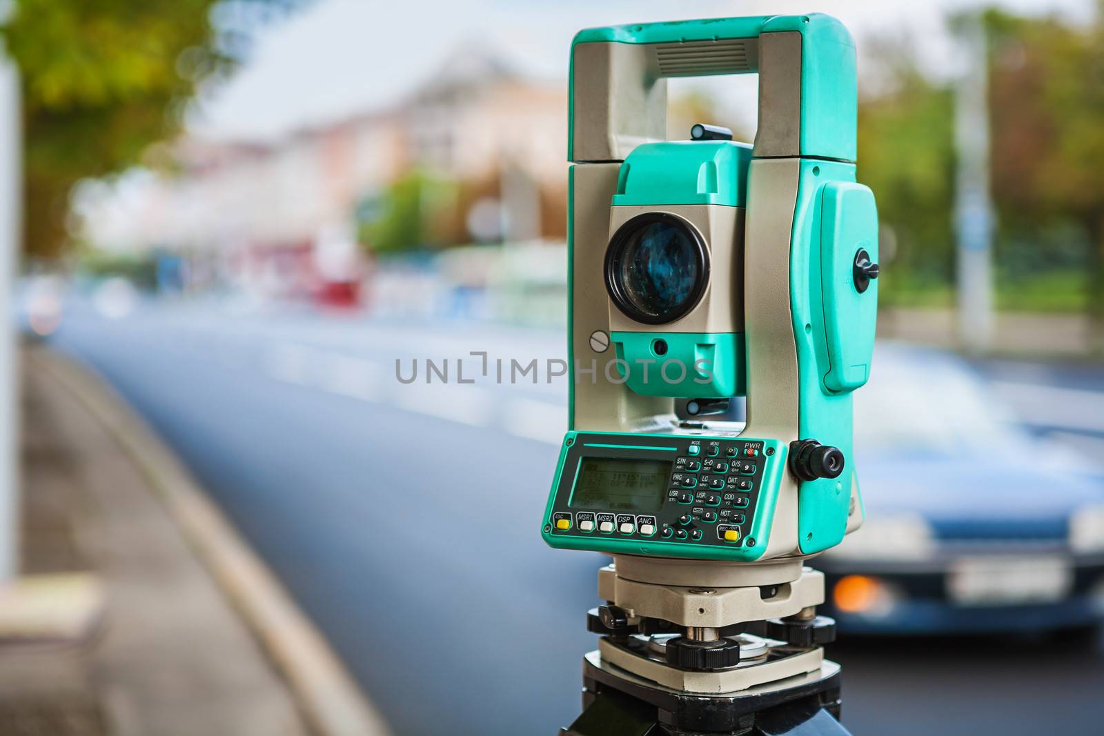 close up view on theodolite urban street by mihalec