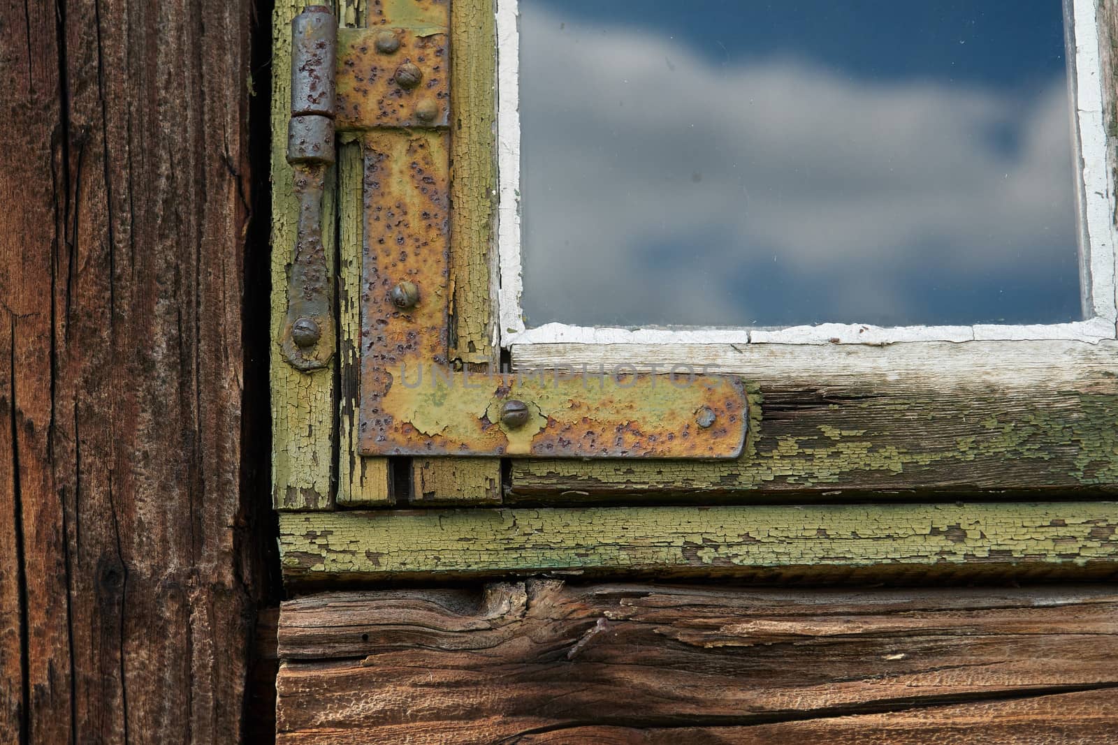 Close up view details of a beautiful old grunged wooden window                               