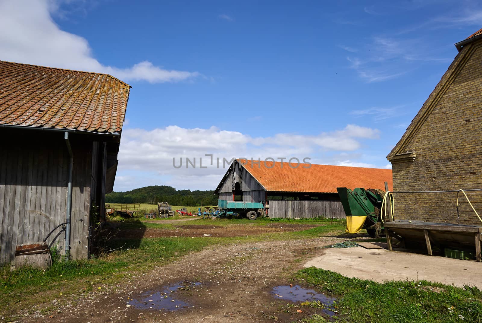 Traditional classical old farm yard and wooden barns