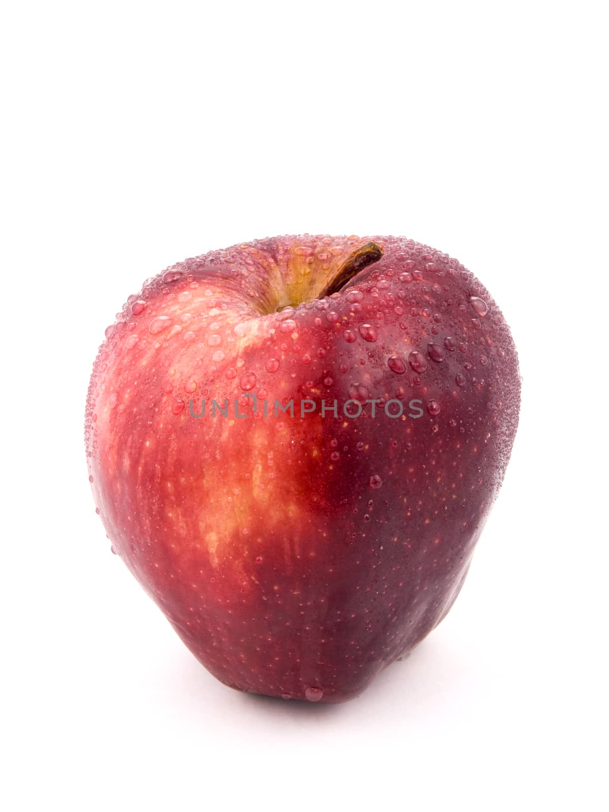 Tasty red apple on white background