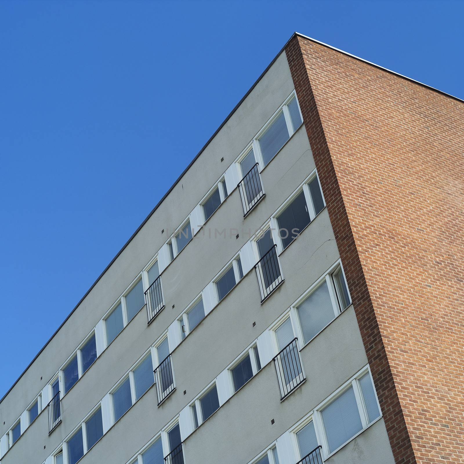 Apartment Building towards blue sky