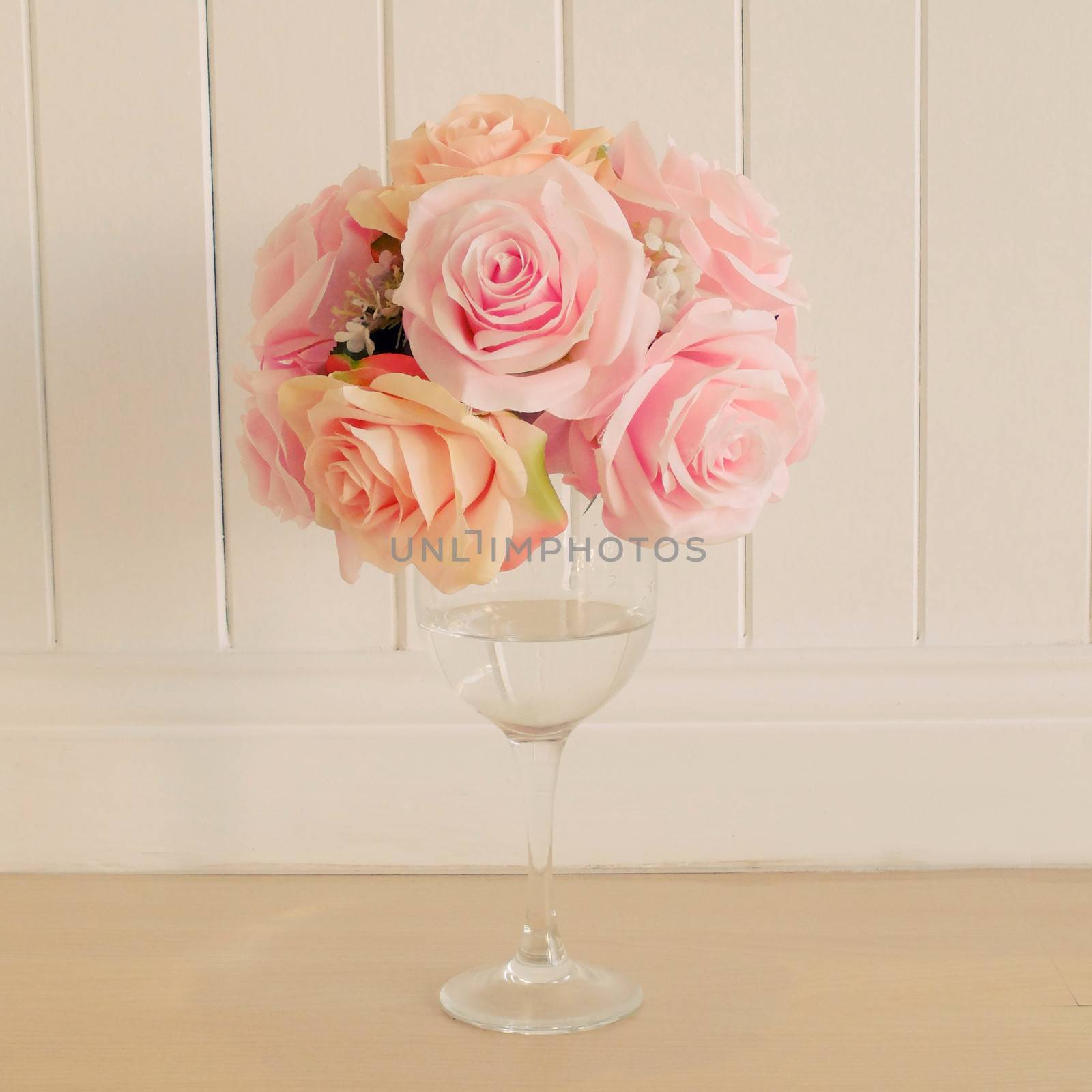 Bunch of rose in glass for decoration with retro filter effect