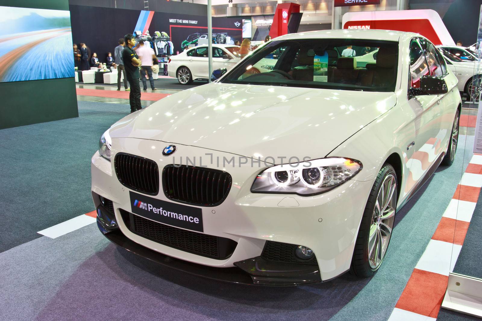 BANGKOK - JUNE 23 : BMW 528i show at The second Bangkok International Auto Salon 2013, the largest and most magnificent Modified Car and automobile accessories show in Bangkok, Thailand.