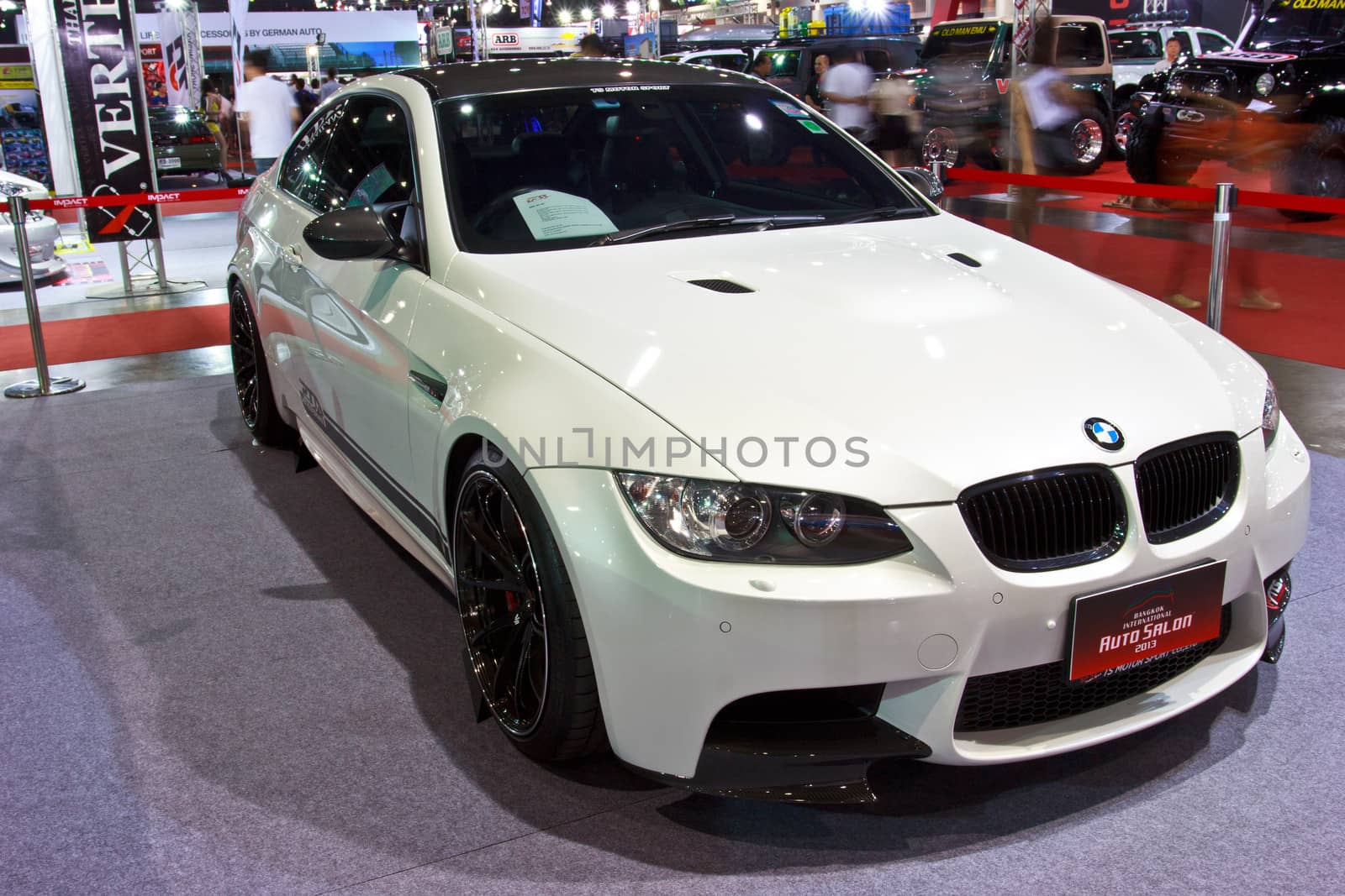 BANGKOK - JUNE 23 : White BMW show at show at The second Bangkok International Auto Salon 2013, the largest and most magnificent Modified Car and automobile accessories show in Bangkok, Thailand.