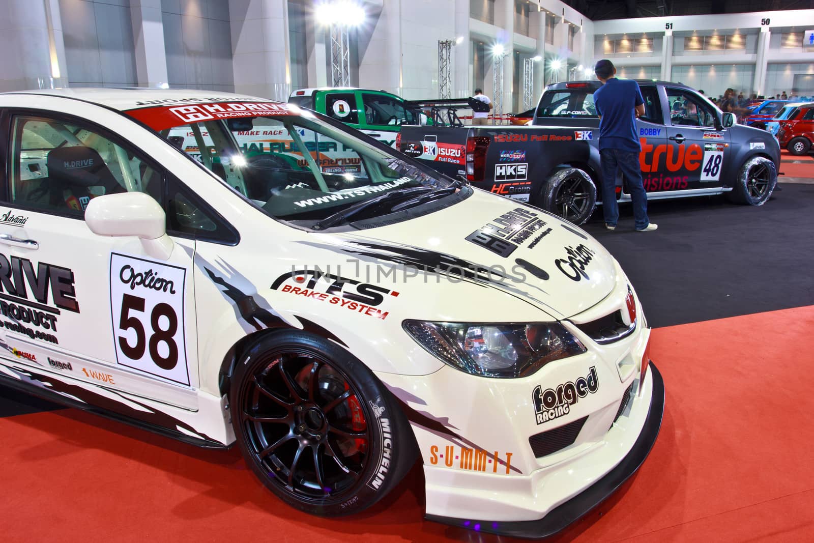 BANGKOK - JUNE 23 : Honda Civic show at The second Bangkok International Auto Salon 2013, the largest and most magnificent Modified Car and automobile accessories show in Bangkok, Thailand.