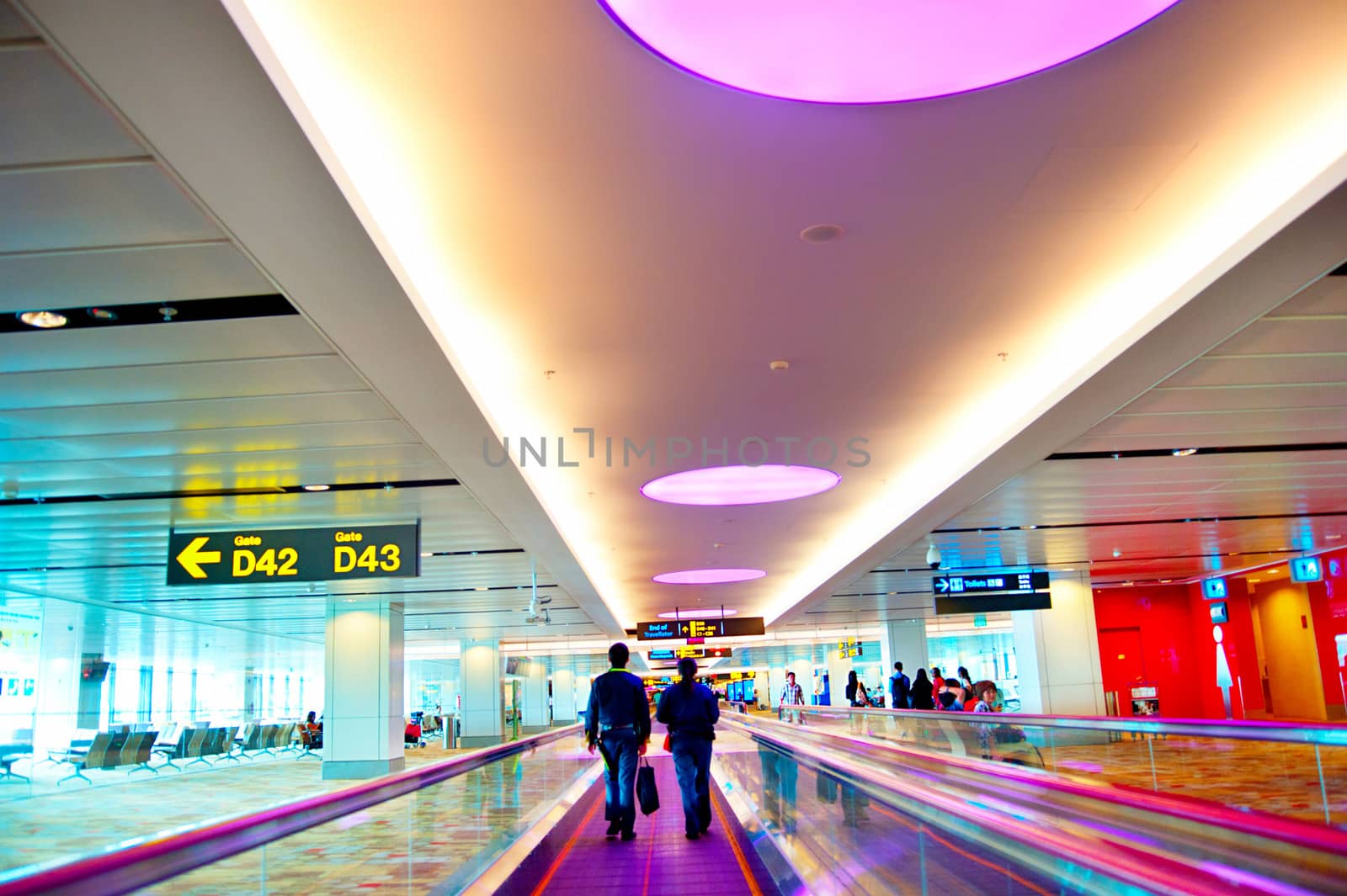 Singapore, Republic of Singapore - March 05, 2013: Travellator at Changi International Airport  in Singapore. Changi Airport serves more than 100 airlines operating 6,100 weekly flights