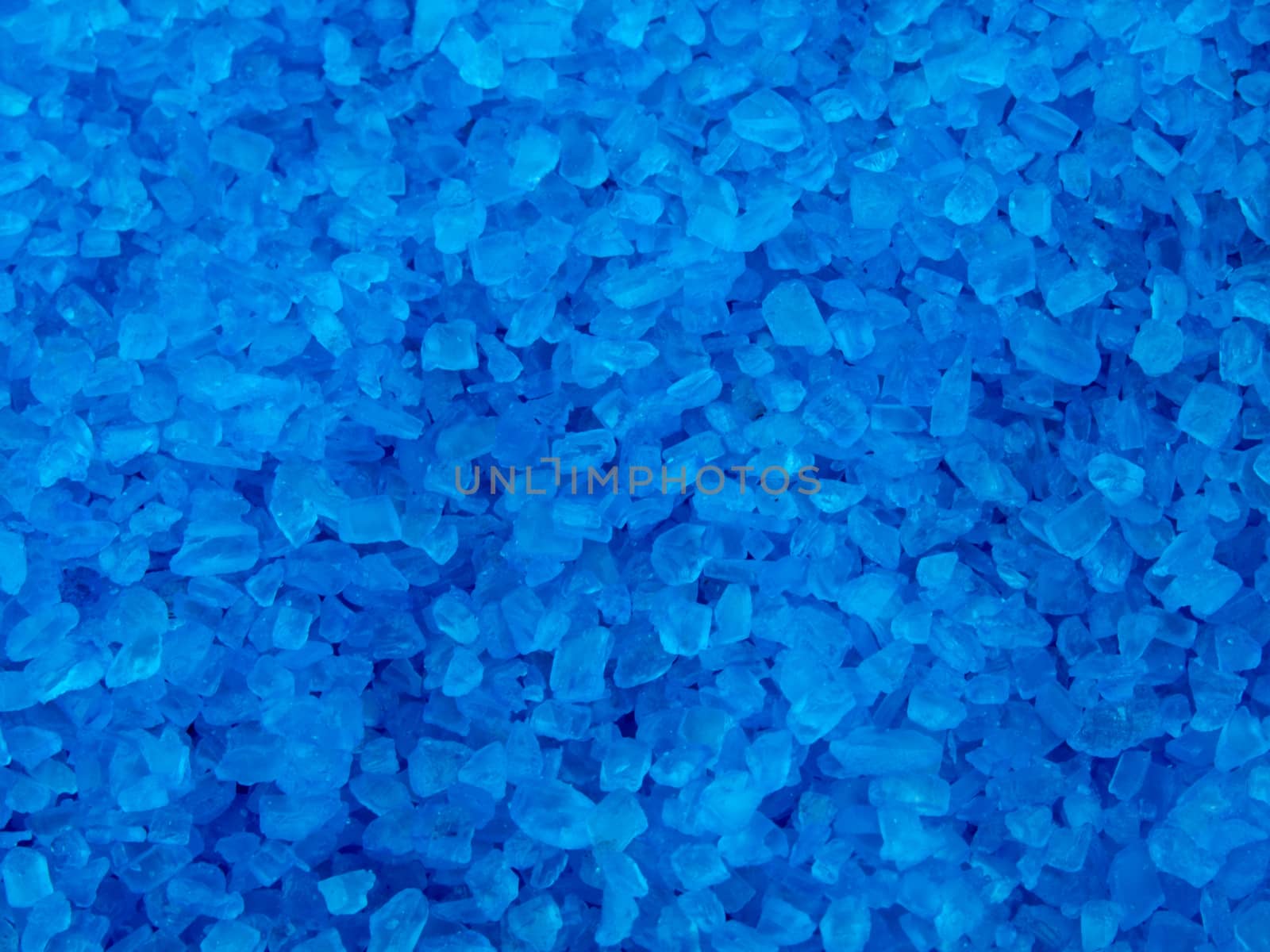 Closeup picture of blue bath salt - spa background