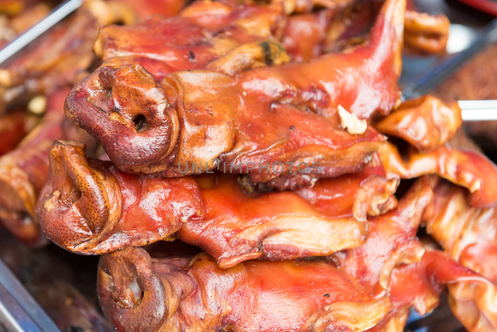 Famous chinese street food roasted pig head