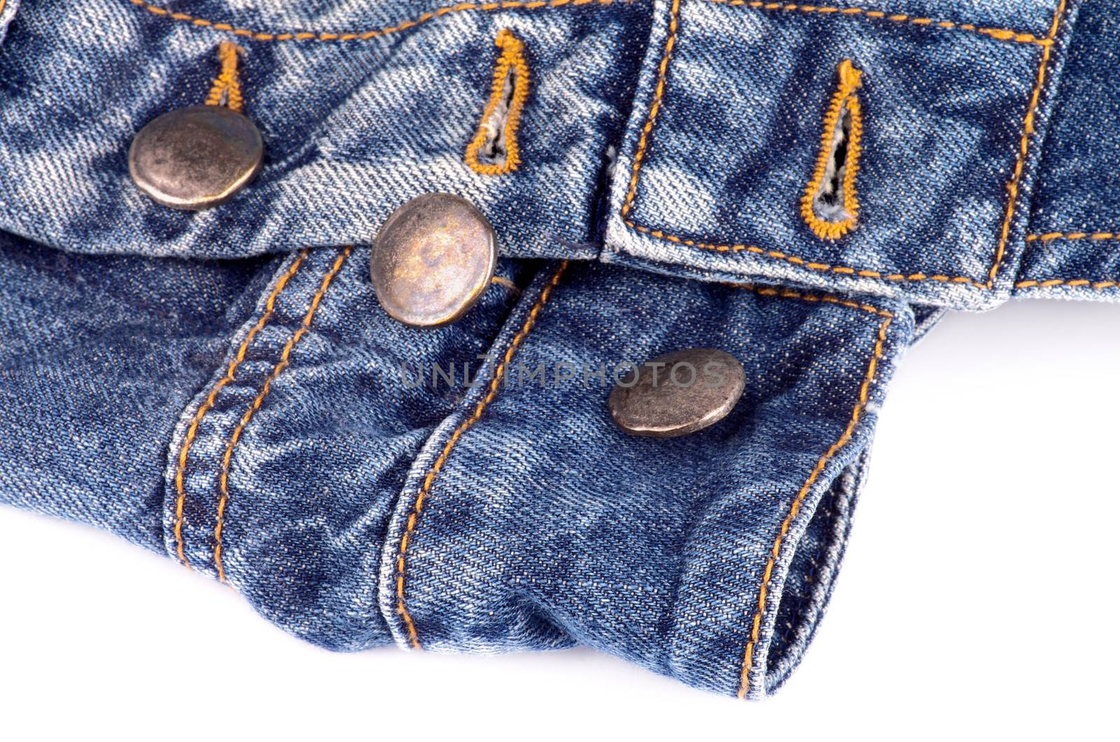 Unfasten Buttons on Blue Jeans closeup on white background