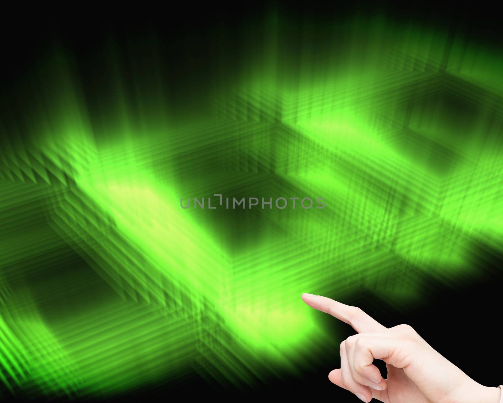 Composite image of businesswoman touching invisible screen on black and green glowing background