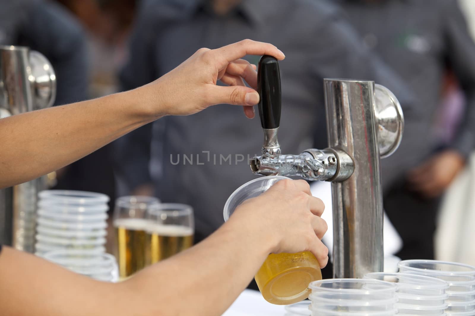 A beer being poured from a beer tap