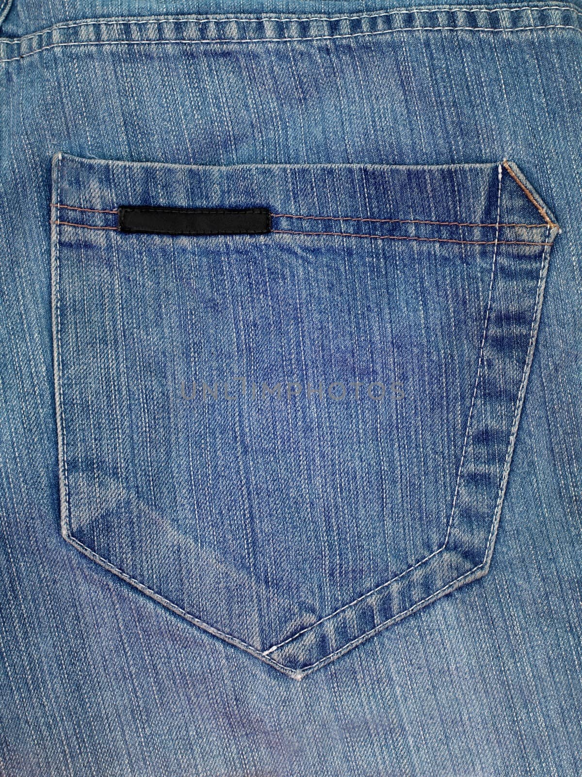 A denium blue jean pocket shot up close