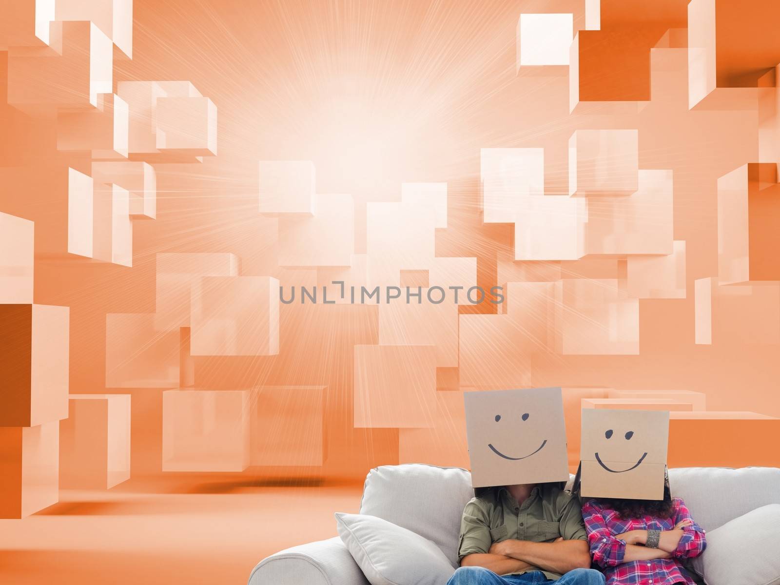 Silly employees with arms folded wearing boxes on their heads by Wavebreakmedia