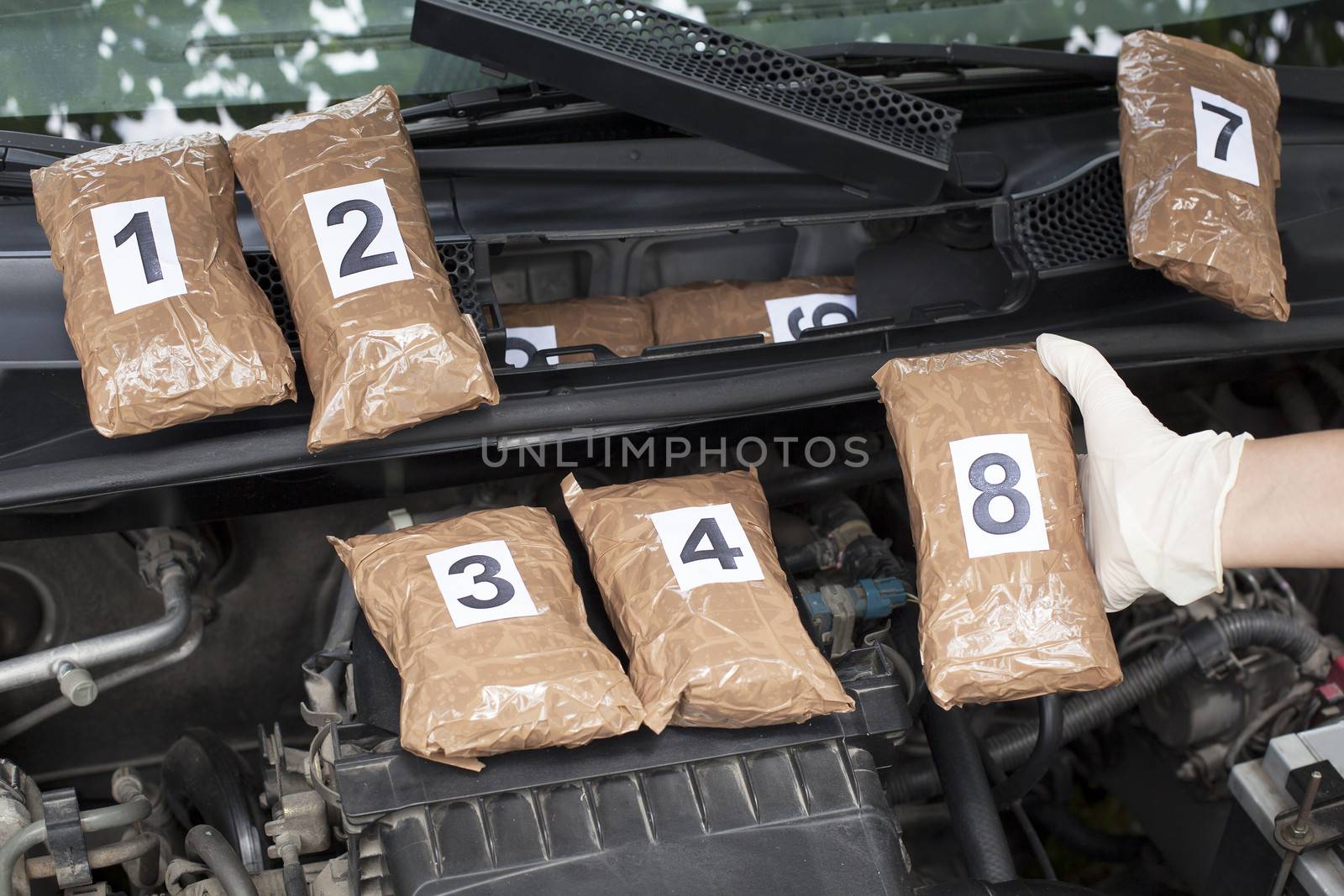 Drug smuggled in a car's engine compartment