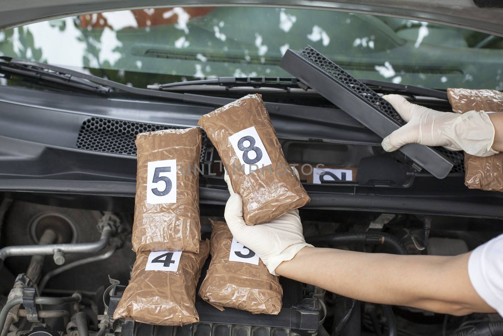 Hidden drugs in a vehicle compartment