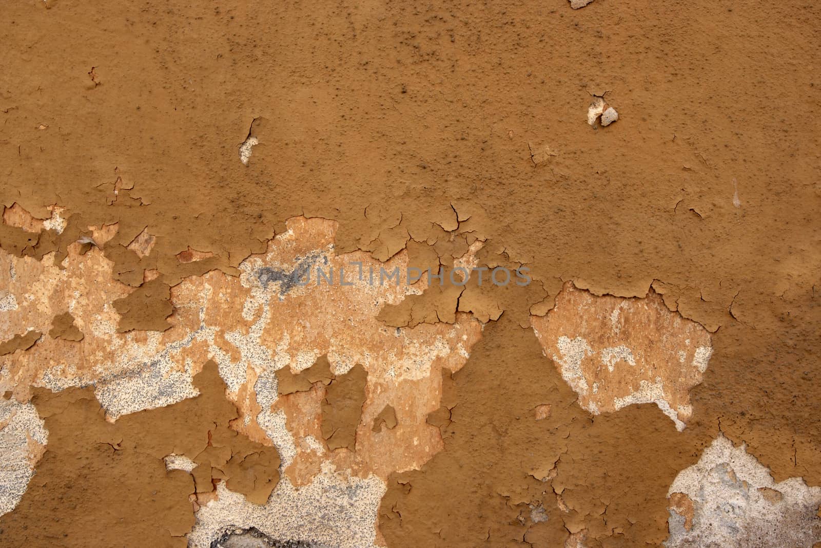 Grunge texture of the old and damaged stucco - plaster