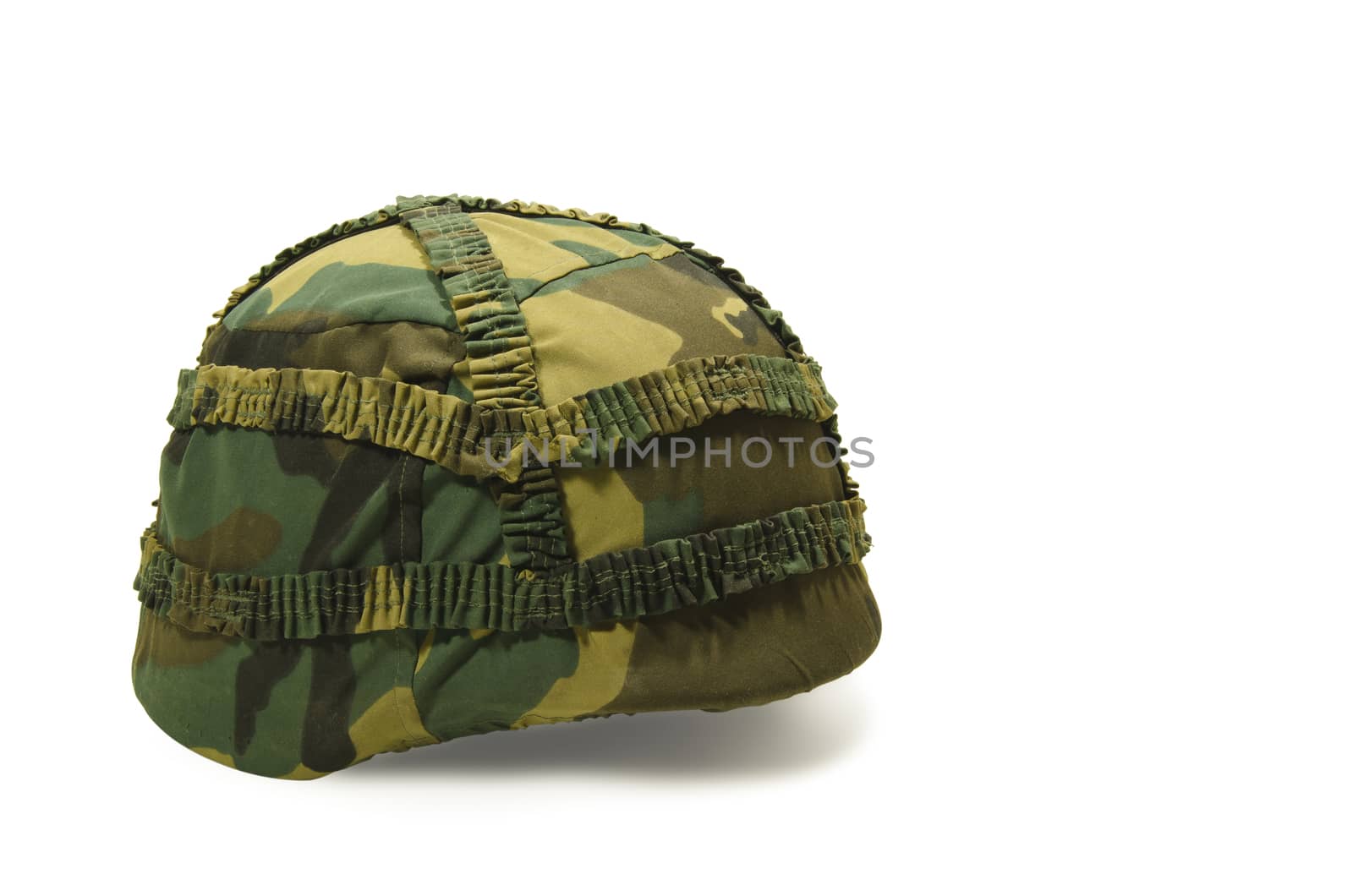 A military helmet of camouflage isolated on white background