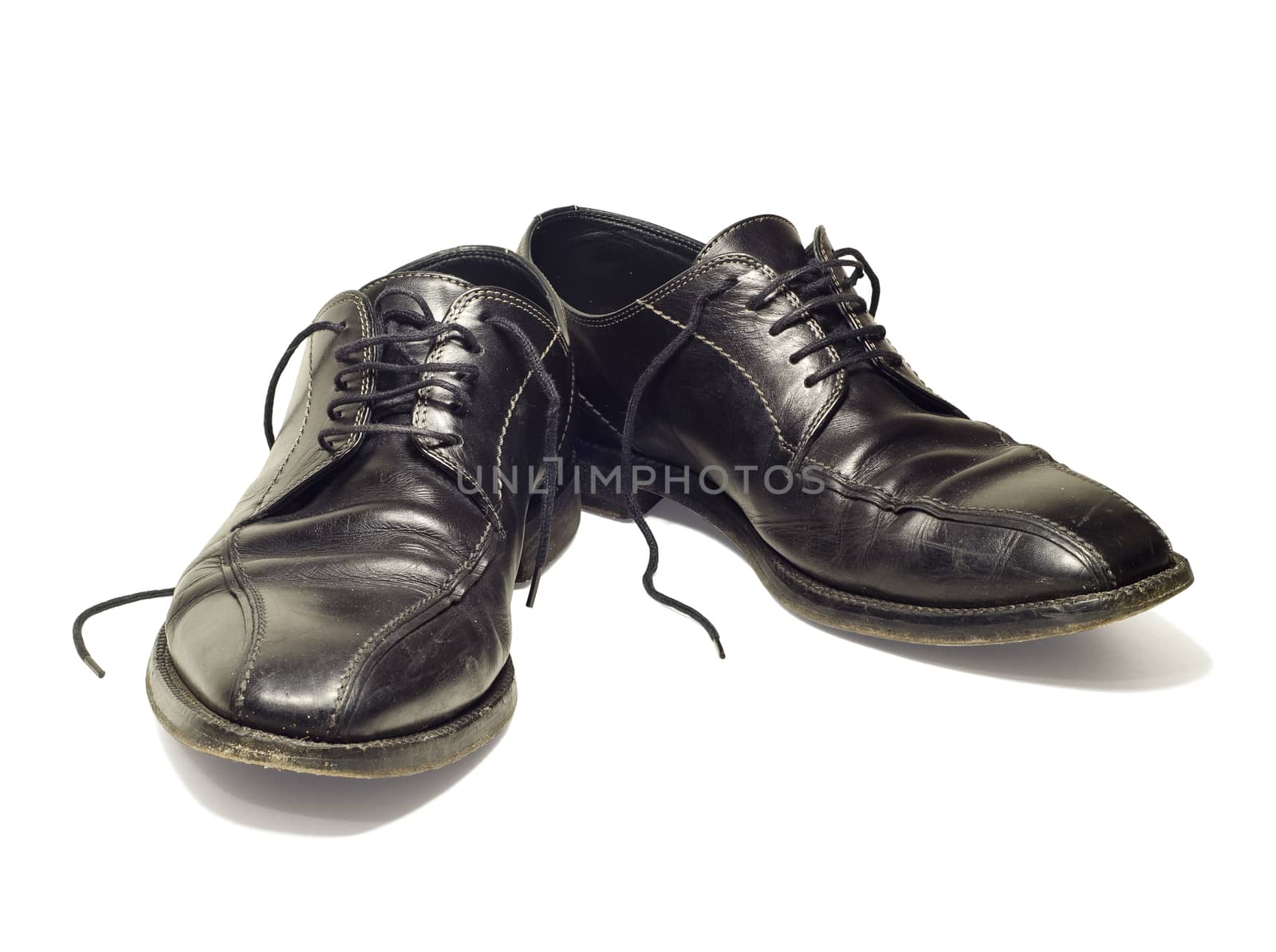 Mens old  leather shoes isolated on white with clipping path