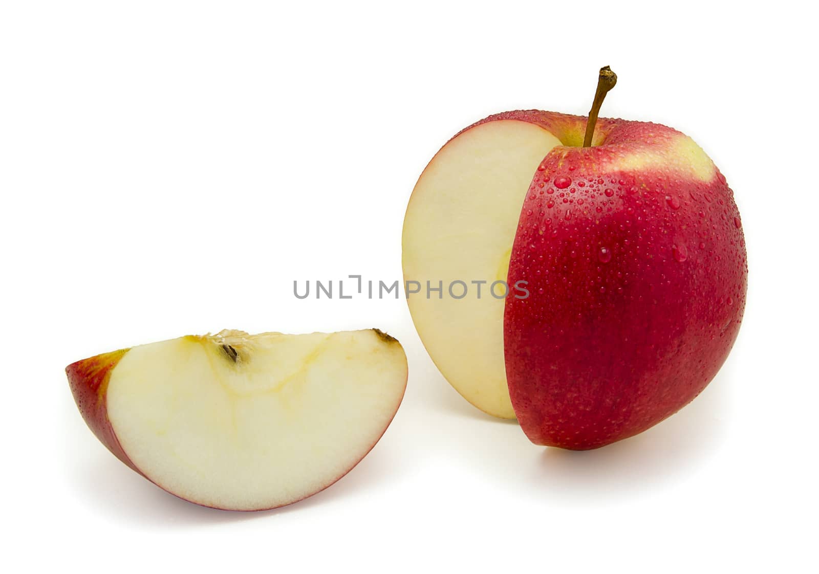 Red apple sliced. Isolated on white background
