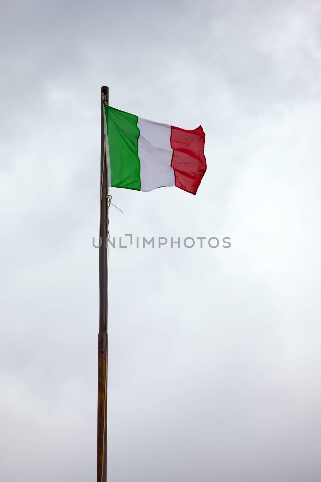 Italian national flag on a mast