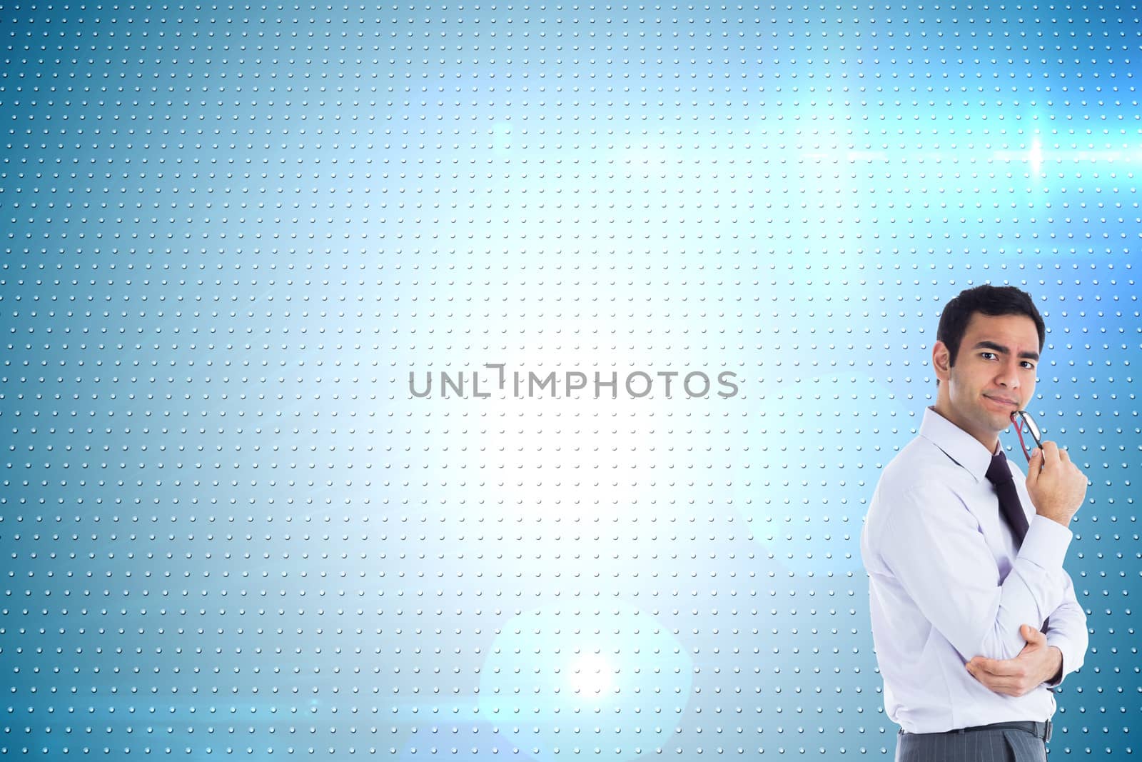 Composite image of thinking businessman holding glasses by Wavebreakmedia