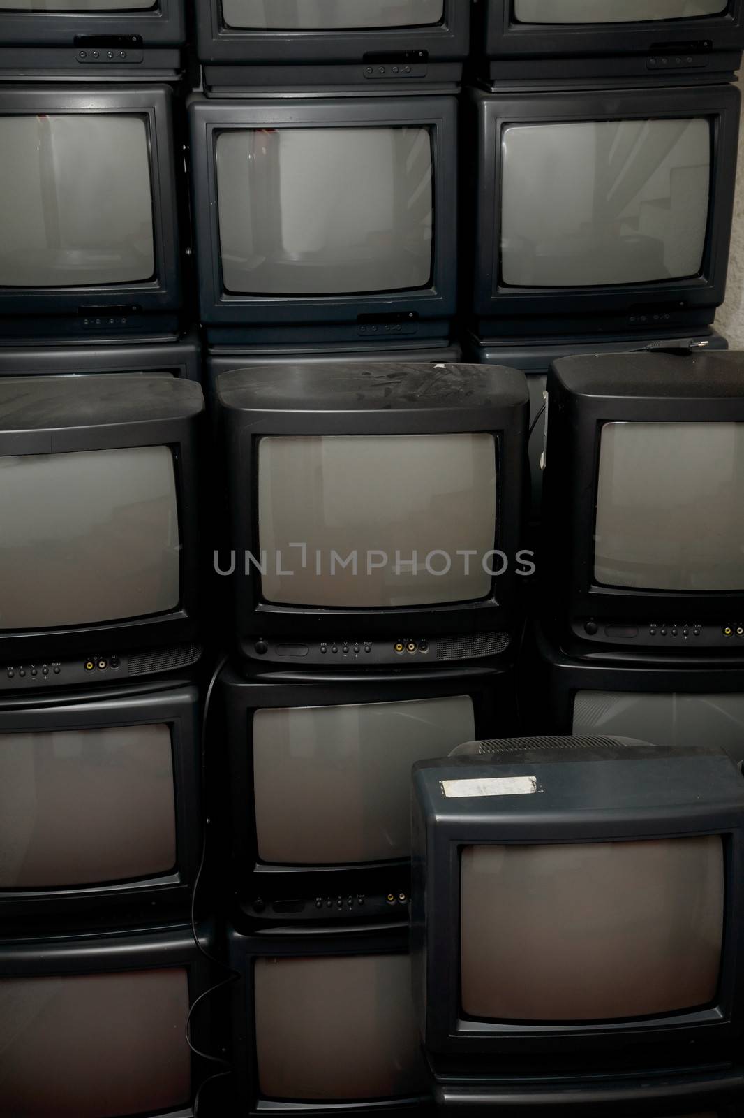 Old TV sets in a pile