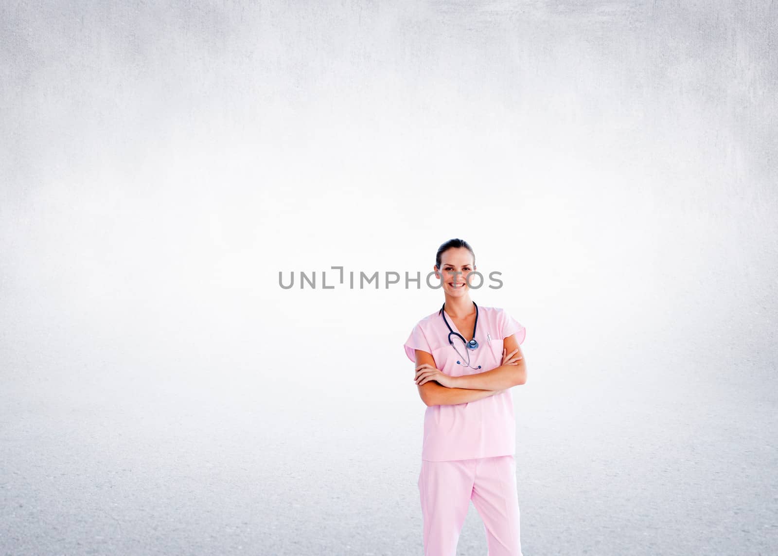 Composite image of isolated beautiful nurse standing in front of the camera with folded arms