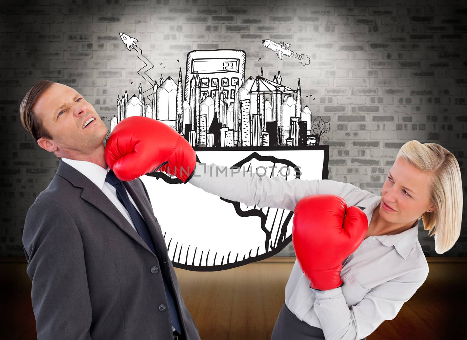 Composite image of businesswoman hitting colleague with her boxing gloves by Wavebreakmedia