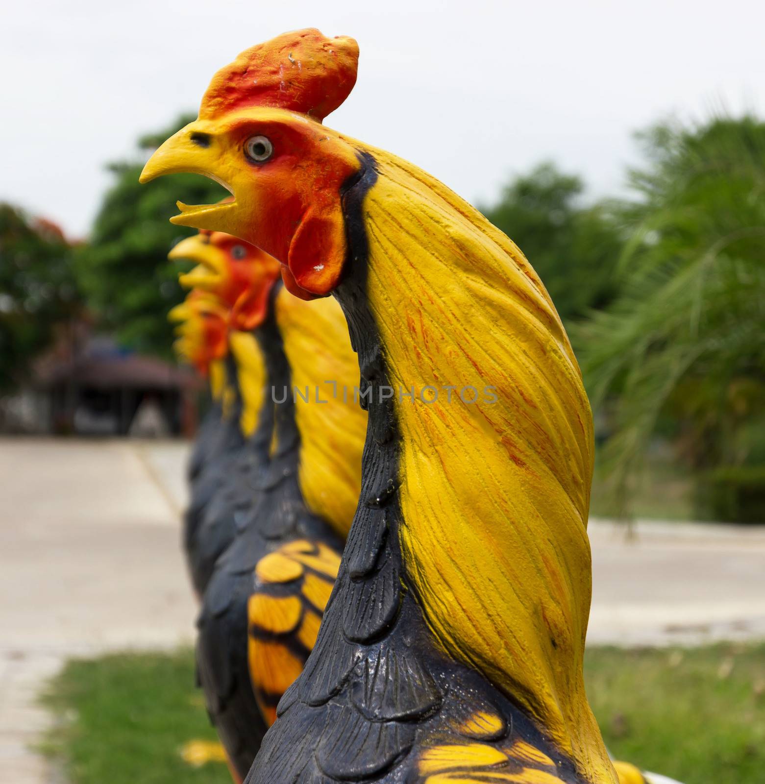 Chicken model, decorated in a garden by sutipp11
