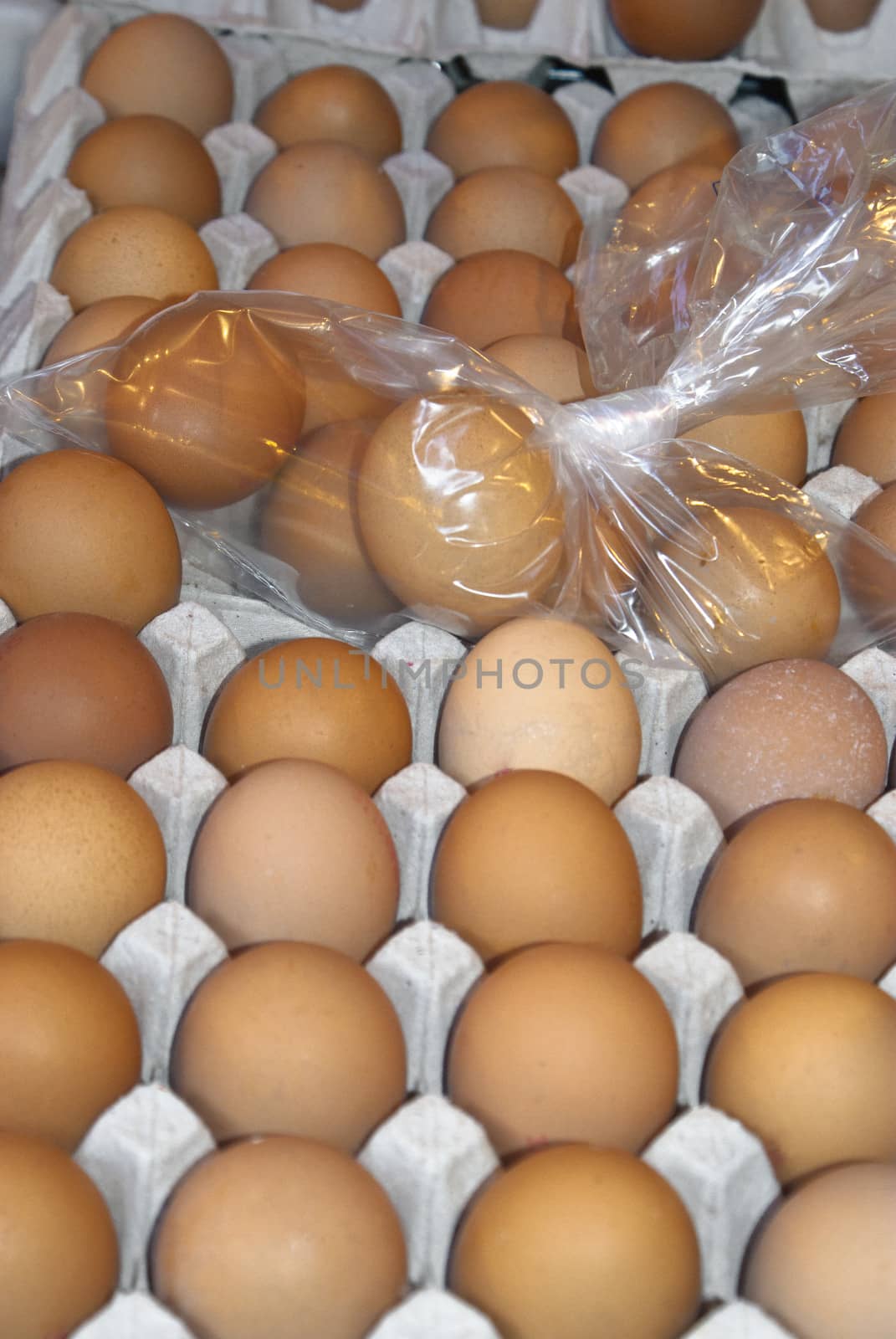 eggs for sale at a market by gandolfocannatella