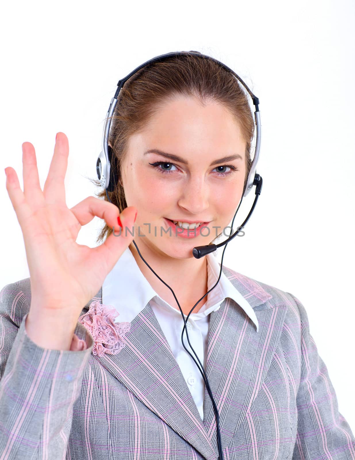 Portrait of beautiful young business woman with headset. Call center. Customer support. Helpdesk.
